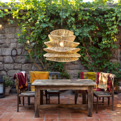 Gen4 Rustic bohemian stone courtyard with a large 80 cm wide woven rattan lamp hanging abov 35552678